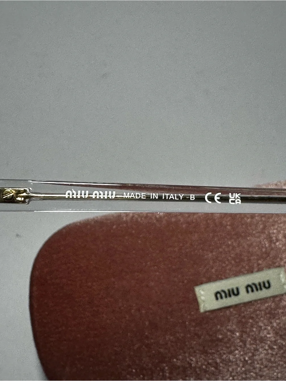Miu Miu Clear Round Eyeglasses with Pink Velvet Case